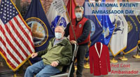 Veteran Albert Summons gets help from Central Arkansas VA Red Coat Ambassador Kim Womack, a surgical nurse. (photo by Jeff Bowen)