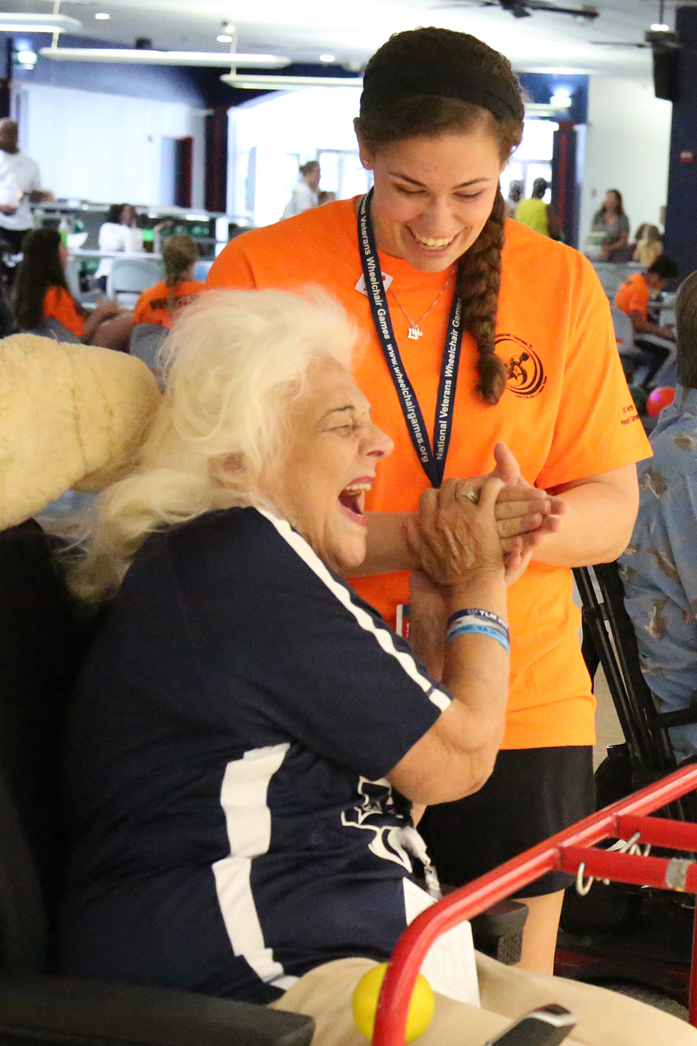 Student volunteer assists Veteran at National Veterans Wheelchair Games